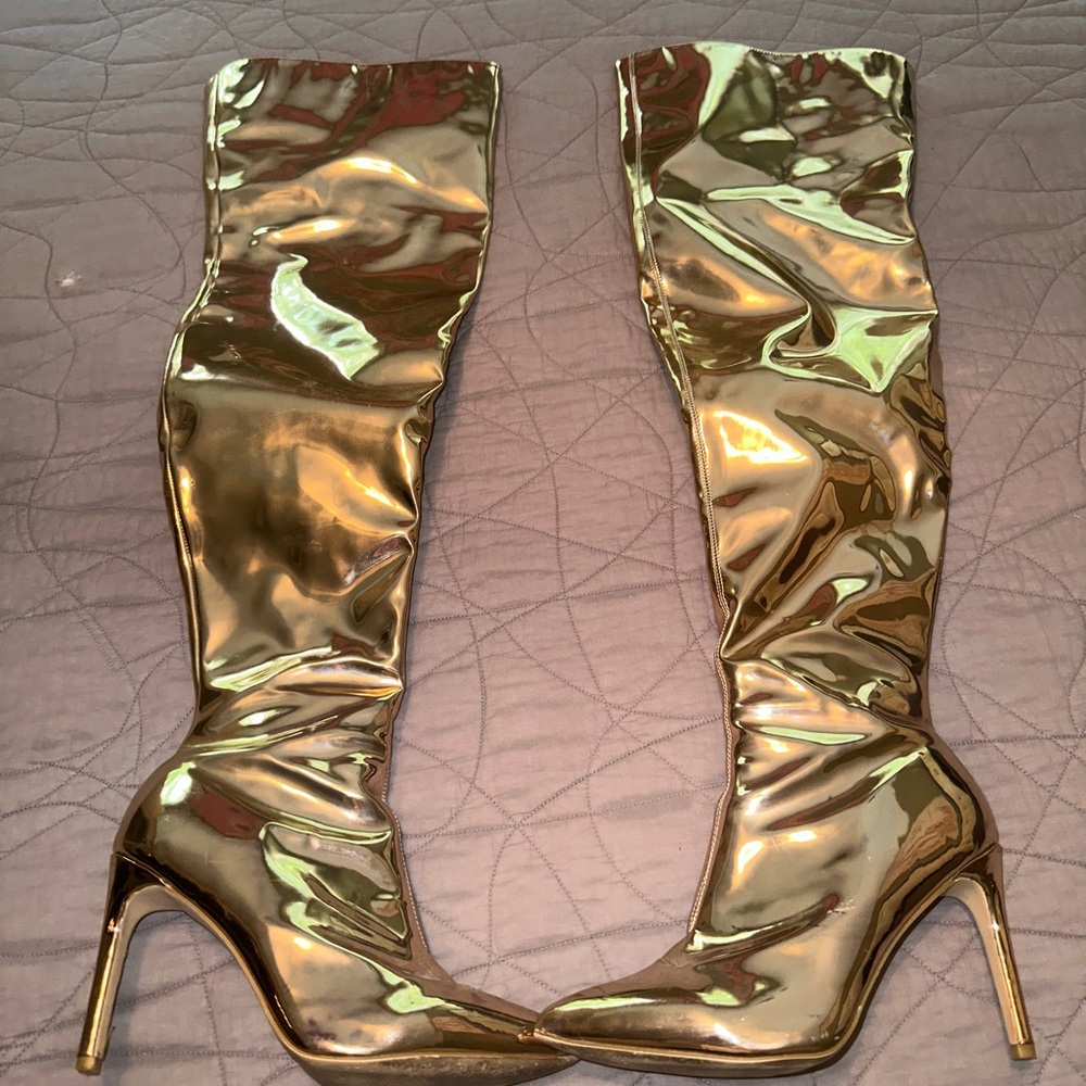 Shiny gold thigh high heel boots